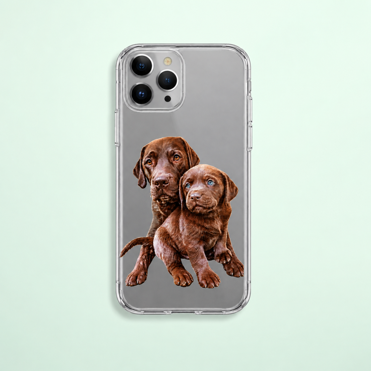 Cover trasparente personalizzata con l'immagine di due cuccioli di labrador marroni.