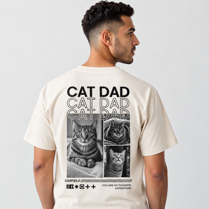 T-shirt beige con motivo di gatto e scritta "CAT DAD" sul retro.