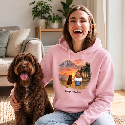 Felpa con cappuccio rosa personalizzata con illustrazione di una persona e un cane nella natura.