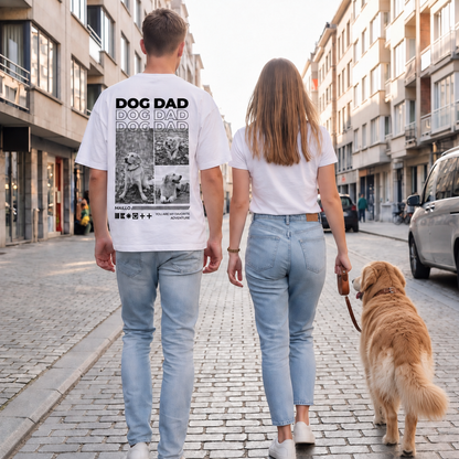 Persone che portano a spasso un cane per strada, una indossa una T-shirt bianca con motivo "DOG DAD".