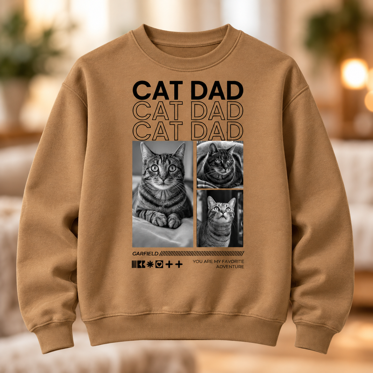 Felpa marrone con motivi di gatti e il testo "Cat Dad".