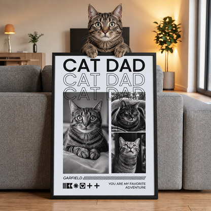Gatto seduto su un poster personalizzato con la scritta "CAT DAD" e foto di diversi gatti.