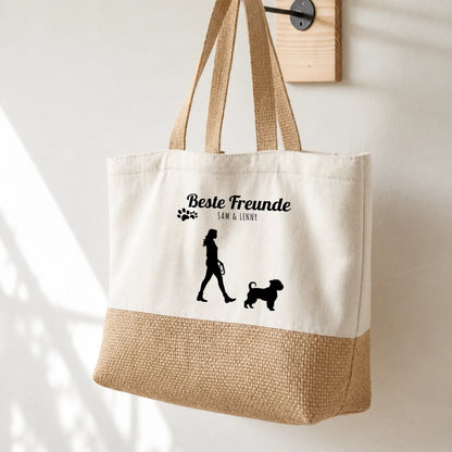 Borsa shopping beige con stampa nera, sagoma di persona e cane, personalizzata con nomi.