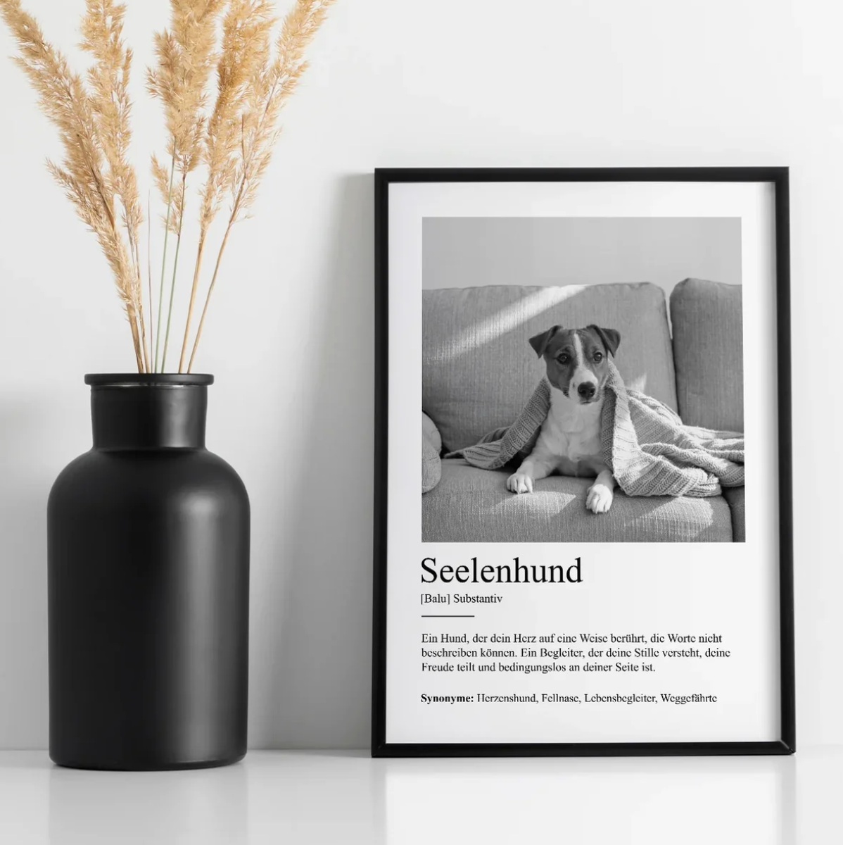 Poster personalizzato con la definizione "Seelenhund" e la foto di un cane su un divano.
