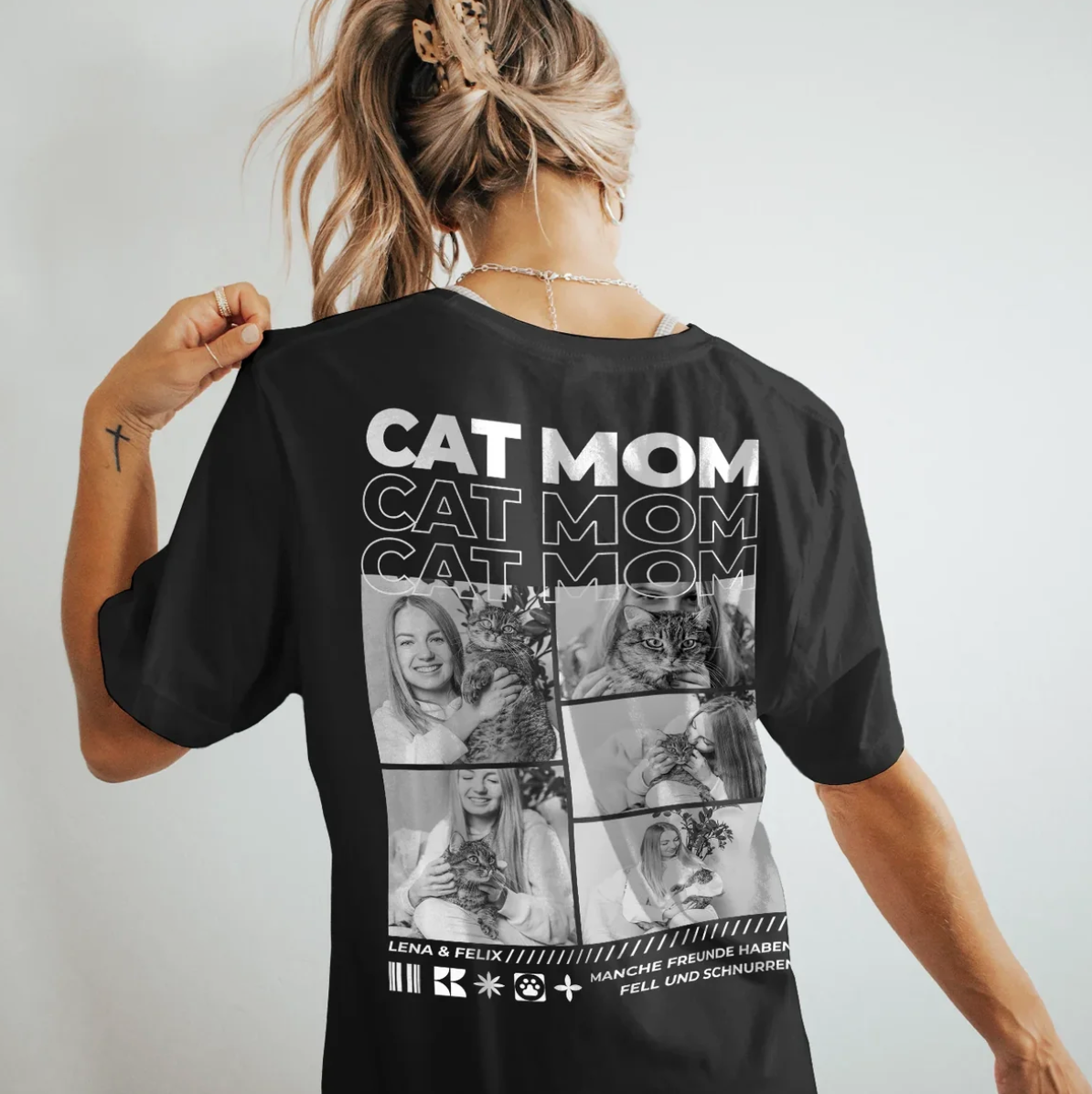 T-shirt nera con la scritta "CAT MOM" e foto di gatti e di una donna sul retro.