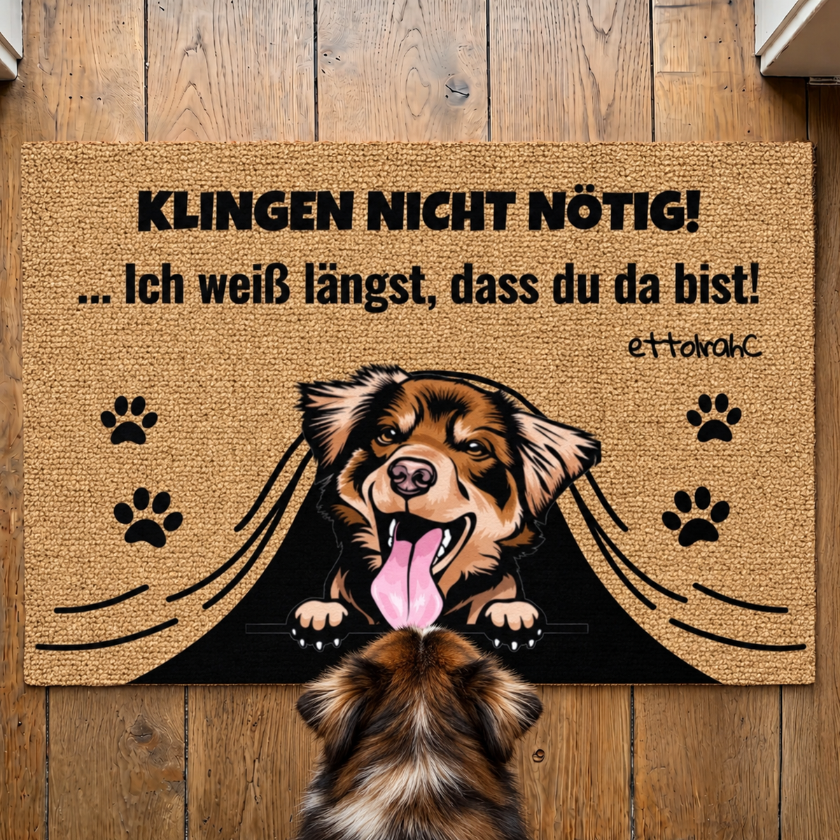 Zerbino in fibra di cocco personalizzato con motivo di cane e il testo "Klingeln nicht nötig!" in nero.