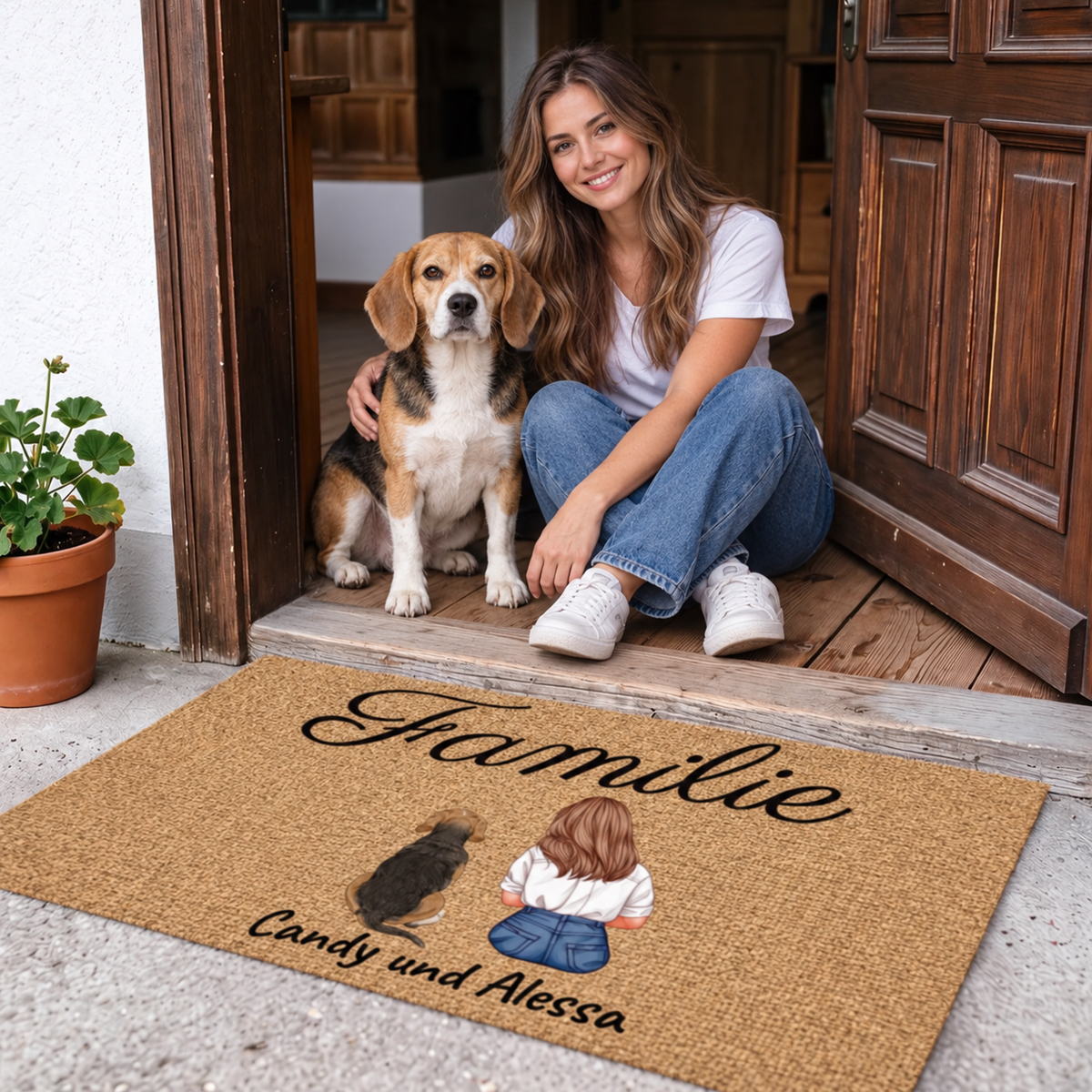Zerbino personalizzato con la parola "Familie" e illustrazioni di due persone e un cane.