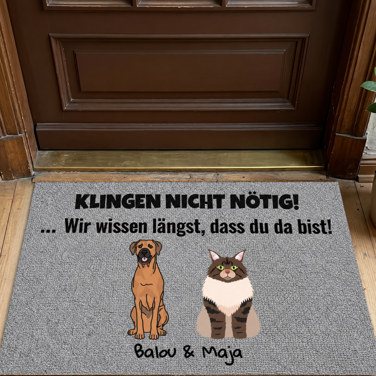 Zerbino personalizzato con la scritta "Klingen nicht nötig!" e illustrazioni di cane e gatto.